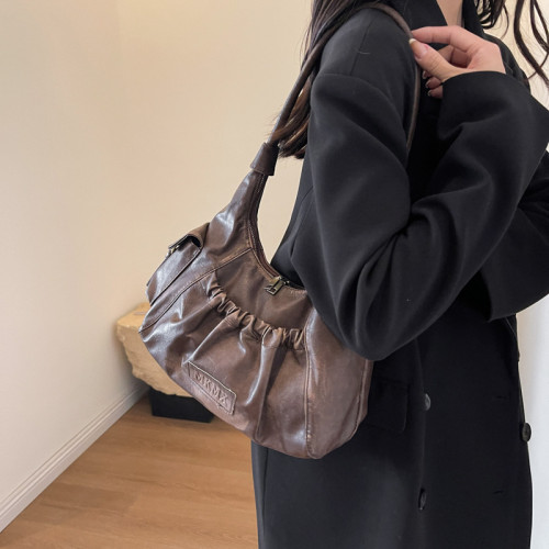 小衆高級感復古辣妹腋下包包女2025新款美拉德風單肩包褶皺餃子包