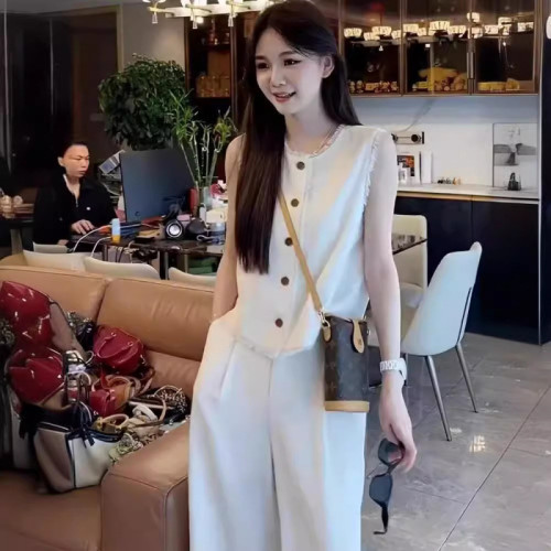 時尚小資背心亞麻馬甲套裝女2025春高級減齡氣質流蘇上衣長褲兩件