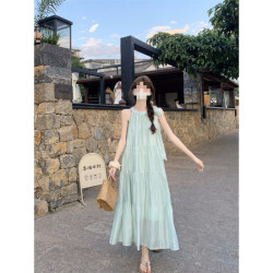 吊帶裙藍色長裙夏季新款海邊度假裙子女薄荷曼波掛脖蝴蝶結連衣裙