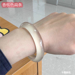 襯膚女白荔枝手鐲凍起螢光冰種瑪瑙香檳色鐲子玉髓馬達加斯加扁條